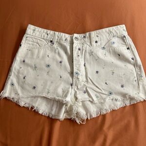 White shorts with flowers imprinted